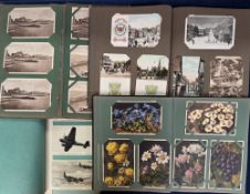 Postcards, a mixed collection of approx. 390 cards in 4 vintage albums inc. approx. 100 printed