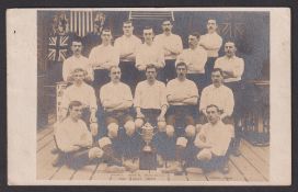 Football postcard, Bury FC, b/w sepia photographic card showing Bury FC teamgroup with the FA Cup.