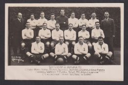 Football postcard, Tottenham Hotspur FC, b/w photographic squad card showing the team & officials