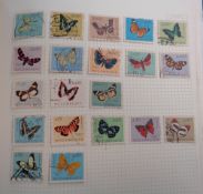 Stamps, World collection in 2 albums, an album of butterflies, and 2 further albums of Jersey,