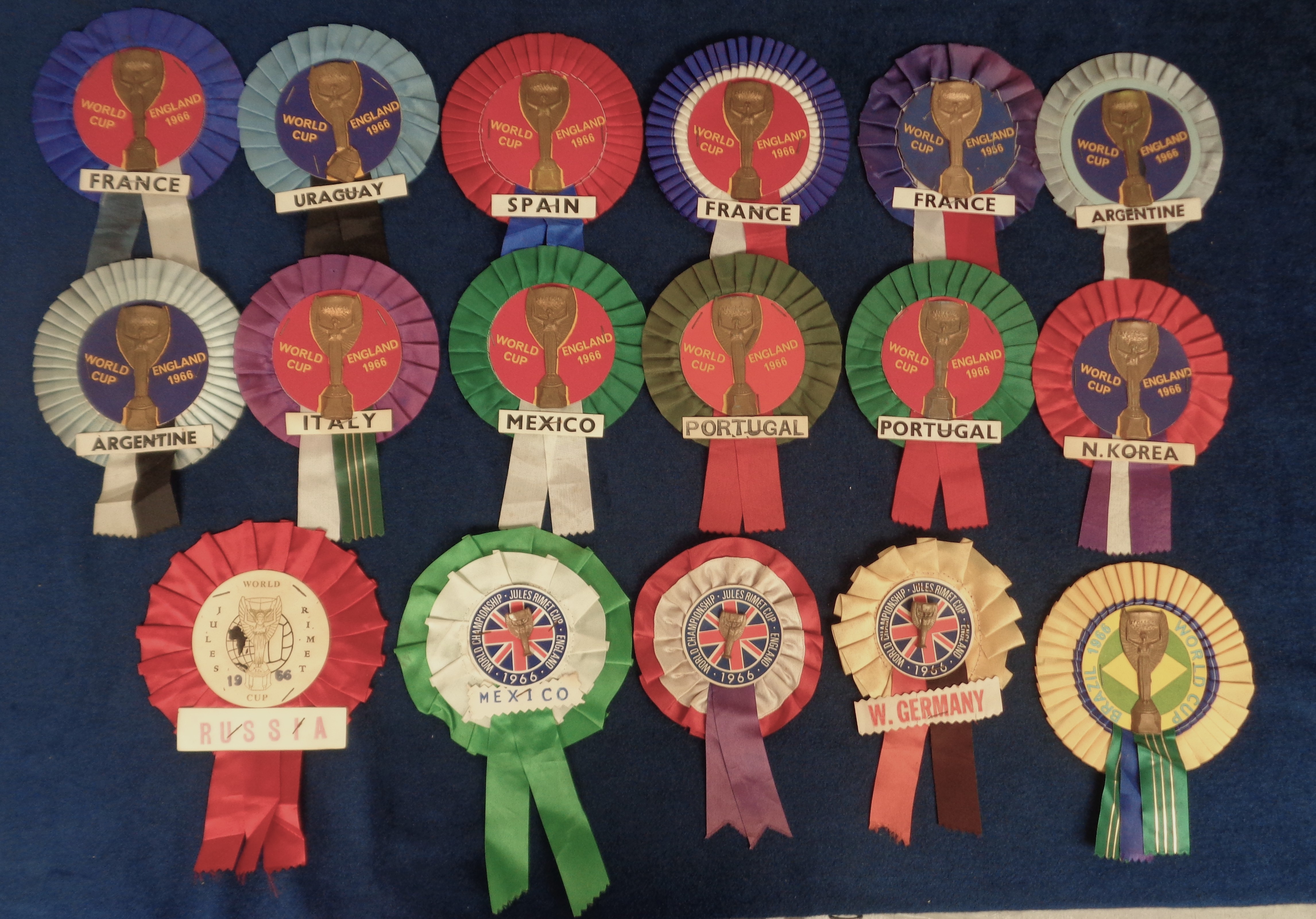 World Cup 1966 England, a folder containing 61 special issue World Cup rosettes with various