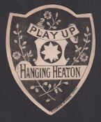 Trade card, Anon, shield shaped card 'Play Up Hanging Heaton' published by Richardson of Leeds (