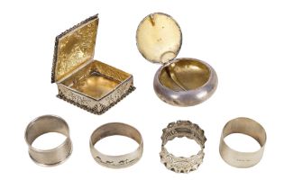 A circular silver tobacco box - Birmingham 1912, gilt lined with a 'secret' sprung hinge cover,