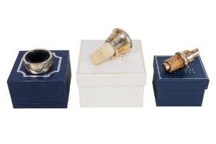 A silver bottle top - Birmingham 2002, the domed top fitted to a tapering cork, 4cm diameter,