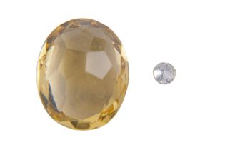 A loose diamond - aprox 3mm diameter, together with a loose citrine. (2)