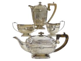A four piece silver tea service - Sheffield 1939, comprising teapot, hot water jug, milk jug and