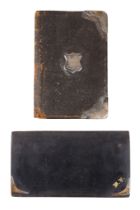 A silver and leather wallet - London, 1910, together with another.