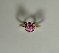 POMELLATO. Bague en or jaune 750°/°° modèle « Nudo Solita » ornée de rubis. Signée et numérotée. Ave