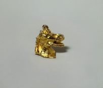Salvador DALI (1904-1989) « Cabeza de Cabello riendo ». 1974. Pendentif tête de cheval riant en bron