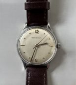 JAEGER LECOULTRE. Montre bracelet, boîtier rond en métal argenté , cadran argenté à index et chiffre