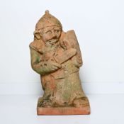 Terracotta garden statue of a warrior with sword and shield, beautiful weathered patina
