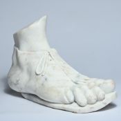 White marble sculpture of a Roman foot
