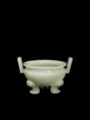 A CELADON JADE TRIPOD-CENSER, China, Qing dynasty, possibly Qianlong