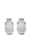 A PAIR OF BLANC-DE-CHINE PORCELAIN HU-SHAPED VASES, China, late 19th/early 20th century