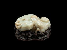 A CELEDON AND RUST JADE GROUP, China, Republic period (1912-1949)