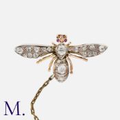 An Antique Old Cut Diamond Insect Brooch in yellow gold and silver, designed as an insect, set