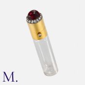 A Fine Antique French Perfume Bottle in 18 carat yellow gold, the cylindrical glass scent bottle,