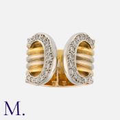 CARTIER, A Diamond C De Cartier Ring in 18 carat yellow, rose and white gold, each terminal