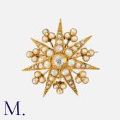 An Antique Pearl and Diamond Star Pendant Brooch in yellow gold, designed as a star, set with pearls