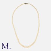 A Pearl Necklace, comprising a single row of pearls measuring from approxaimtely 2.5-6.1mm,