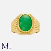 A Jade Signet Ring in 20 carat yellow gold, set with a cabochon jade measuring approximately 12.7