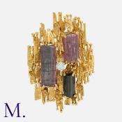 ALAN MARTIN GARD, A Modernist Rough Tourmaline and Old Cut Diamond Brooch / Pendant in 18 carat
