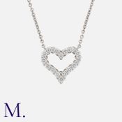 TIFFANY & CO, A Diamond Heart Pendant Necklace in platinum, the heart pendant set with round cut