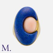 BULGARI, A Vintage Lapis Lazuli and Coral Ring in 20 carat yellow gold, set with carved lapis