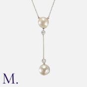 A Pearl and Diamond Necklace in 18 carat white gold, comprising a pearl of approximately 9.5mm