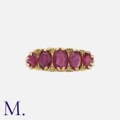 An Antique Ruby and Diamond 5-Stone Ring in yellow gold, set with five oval cut rubies with