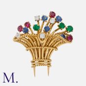 CARTIER, A Vintage Gem-Set Giardinetto Brooch in 18 carat yellow gold, designed as a basket of