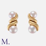 BULGARI, A Pair of Pearl Earrings in 18K yellow gold, each set with two pearls measuring approx. 7mm