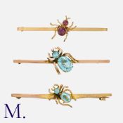 A Collection of Three Spider Bar Brooches in 9 carat gold. Each formed as a gem set spider to a