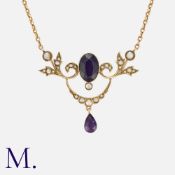 An Amethyst and Pearl Pendant Necklace in 9 carat gold, set with an oval cut and pear shaped