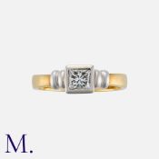 A Diamond Ring in 18K yellow and white gold set with a princess cut diamond weighing approx. 0.50ct.