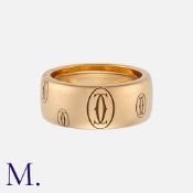 CARTIER, A 'Happy Birthday' Ring in 18 carat rose gold, the wide band with repeated double C logo