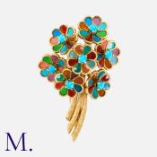 HERMES. A Plique a Jour Flower Brooch in 18ct yellow gold, set with turquoise cabochons and multi-