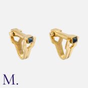 CARTIER. A Pair of Sapphire Cufflinks in 18K yellow gold, set with sapphire terminals. Signed