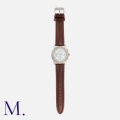 LOUIS PION. A Chronograph Wristwatch with stainless steel case, with gem-set bezel and mother of