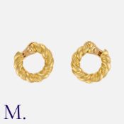 VAN CLEEF & ARPELS. A Pair of Hoop Earrings in 18K yellow gold with twisted design. Signed VCA and