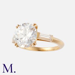 BOUCHERON. A Diamond Ring in 18K yellow gold with a centre diamond weighing 3.87ct (certified H/