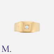 A Diamond Gypsy Signet Ring in 18k yellow gold, the wide band set centrally with a round cut diamond