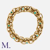 An Antique Turquoise and Pearl Bracelet in yellow gold, with sprung links allowing the bracelet to