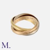 CARTIER. A Trinity Ring in 18K yellow, white and rose gold with 3.5mm bands. Signed Cartier to the