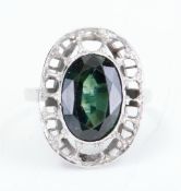A vintage platinum openwork ring set with a metova alexandrite stone(?), tested for platinum, weight