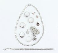 A lot of various silver jewellery, consisting of a modern necklace, bracelet, pendants and rings, Du