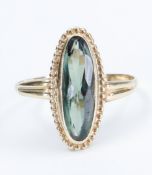 Yellow gold vintage ring, 14kt set with an oval fluorite, tested at 14kt, 
2.5 grams. 
55/17,5