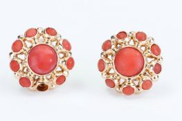 A set of yellow gold entourage stud earrings, 14kt. set with cabochon-cut blood coral, Dutch hallmar
