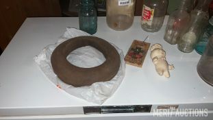 Group of Glass Bottles and Wooden Hat Brim
