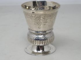 An 18th century Continental silver Beaker of thistle shape with engraved frieze above gadroon and